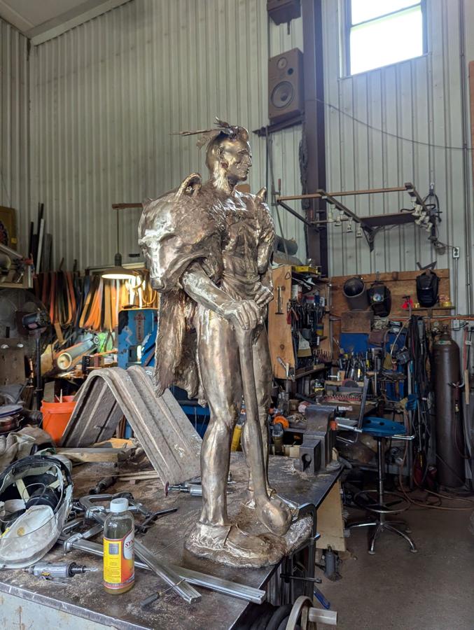 Bronze figure in the workshop. The sculptural form translated into metal.